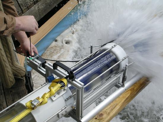 hydroelectric turbine, water exiting from corkscrew-like helical coils.